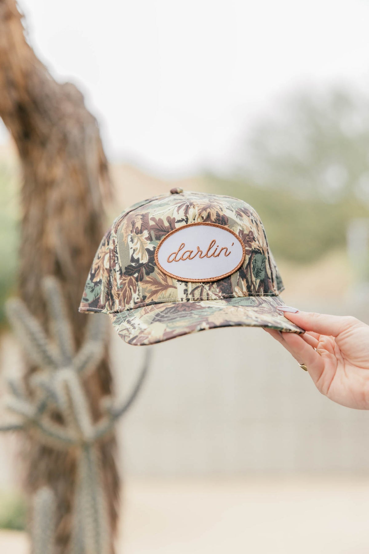 DARLIN Patch Trucker Hat in Camo