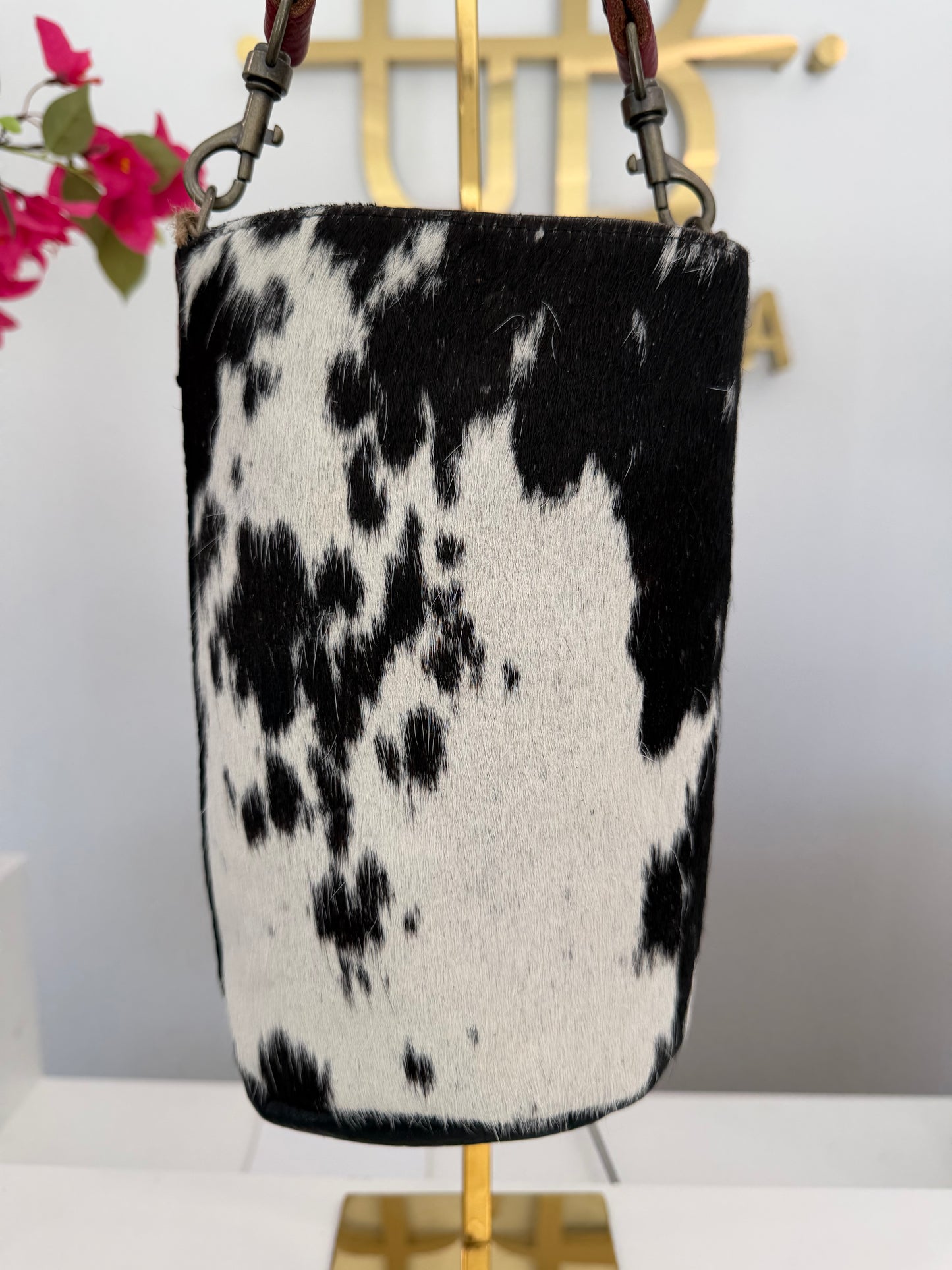 Black and White Cowhide Small Bucket Bag w/ Red Strap
