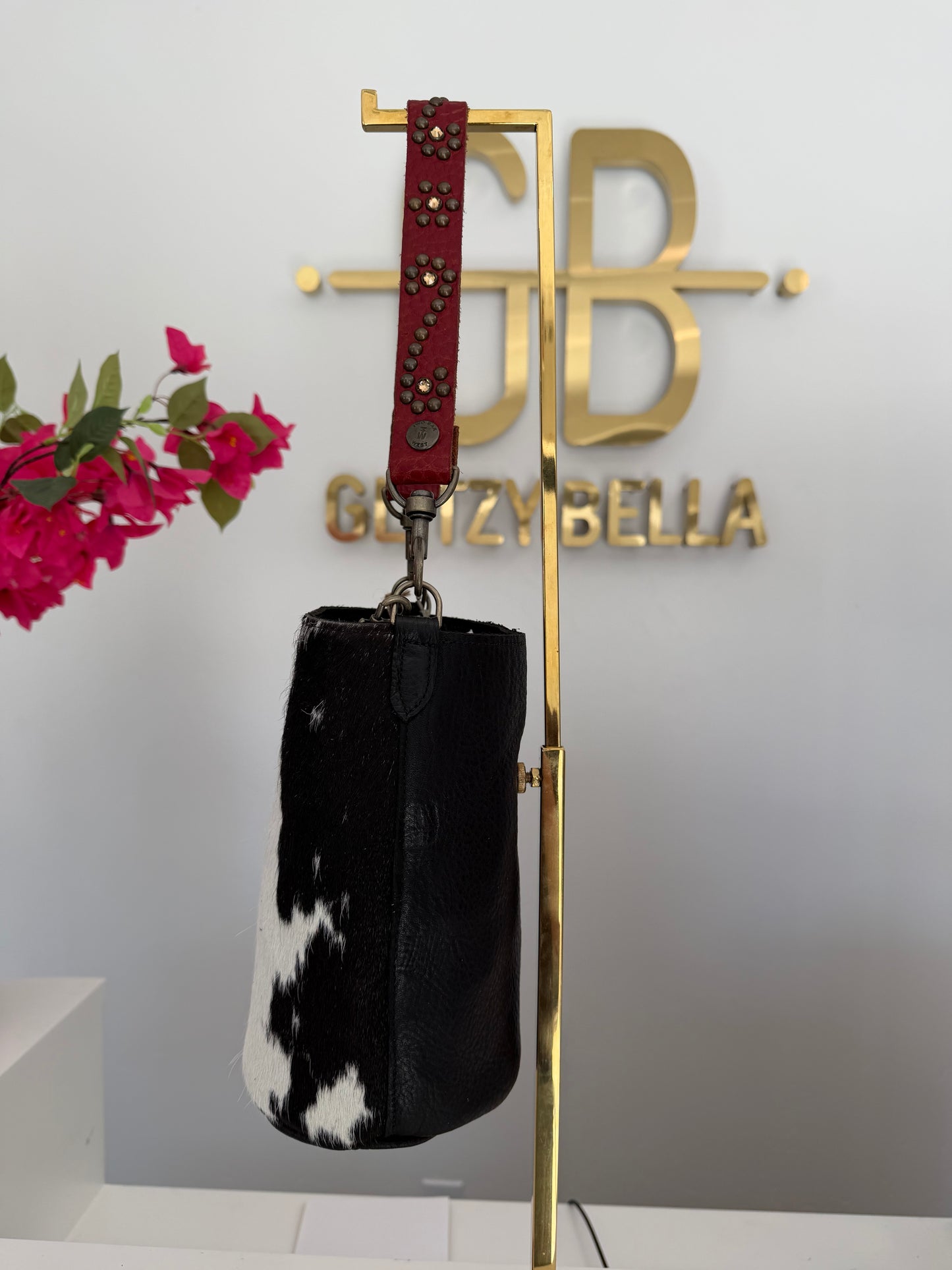 Black and White Cowhide Small Bucket Bag w/ Red Strap