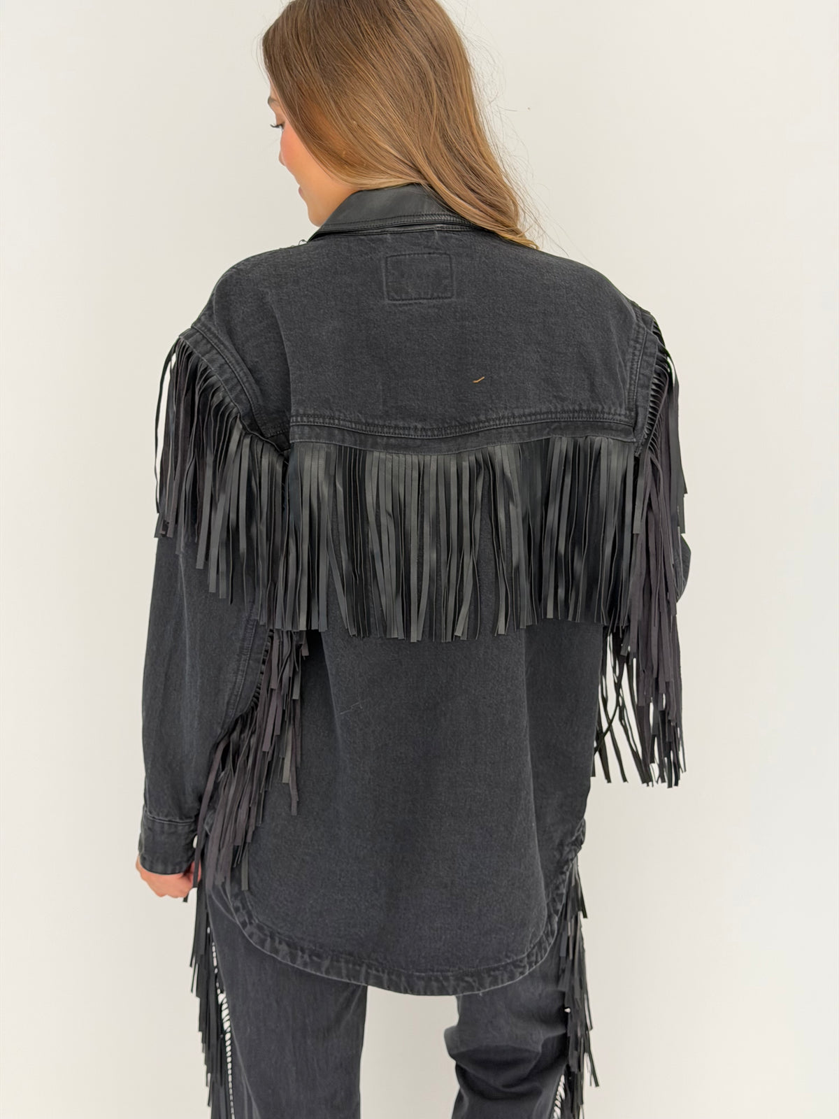 Pony Up Fringe Jacket in Black