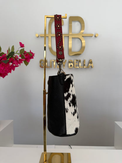 Black and White Cowhide Small Bucket Bag w/ Red Strap