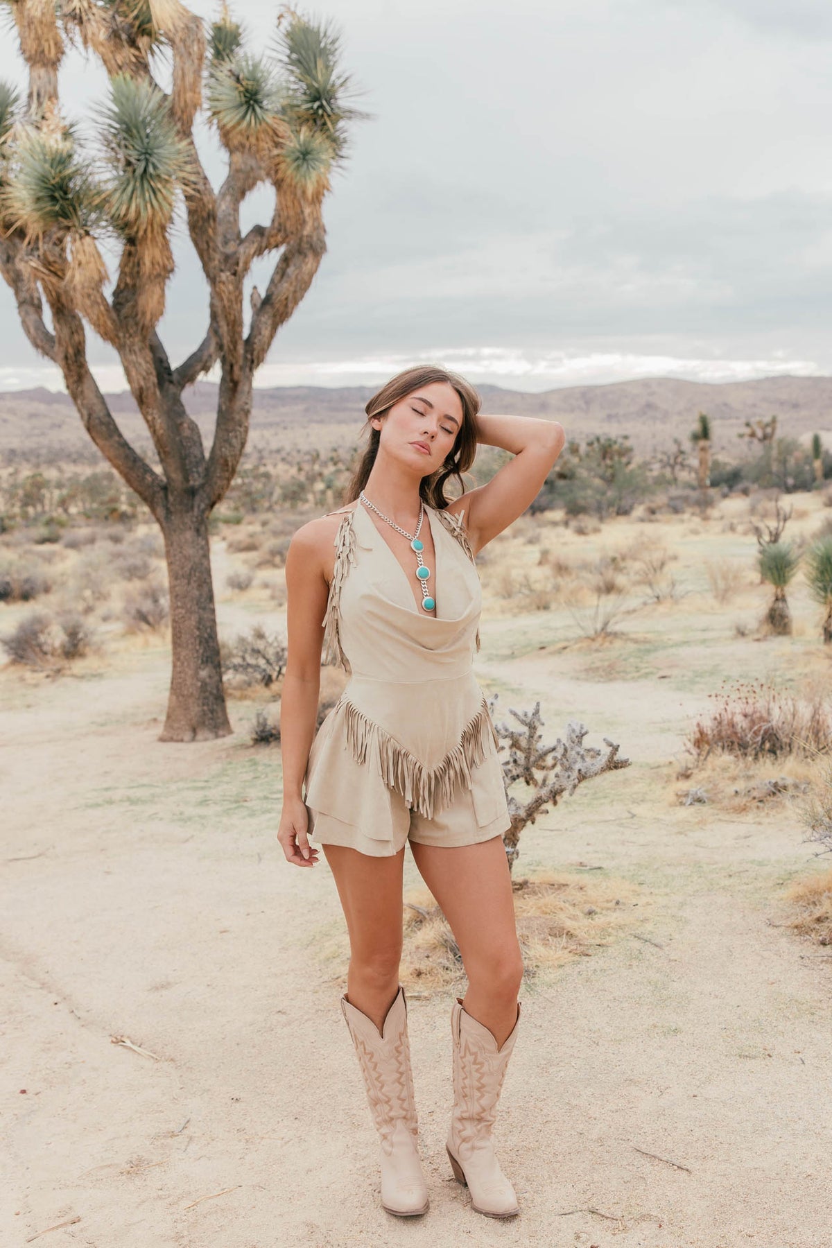 Dallas Suede Fringe Romper in Sand